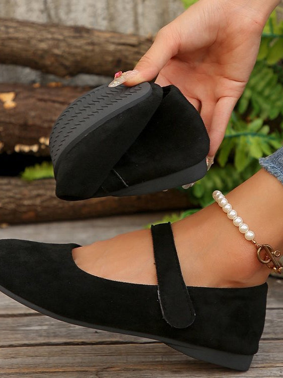 Melba Lane - black rounded toe Mary Jane flats, single shoe held in hand, AU women's sizes