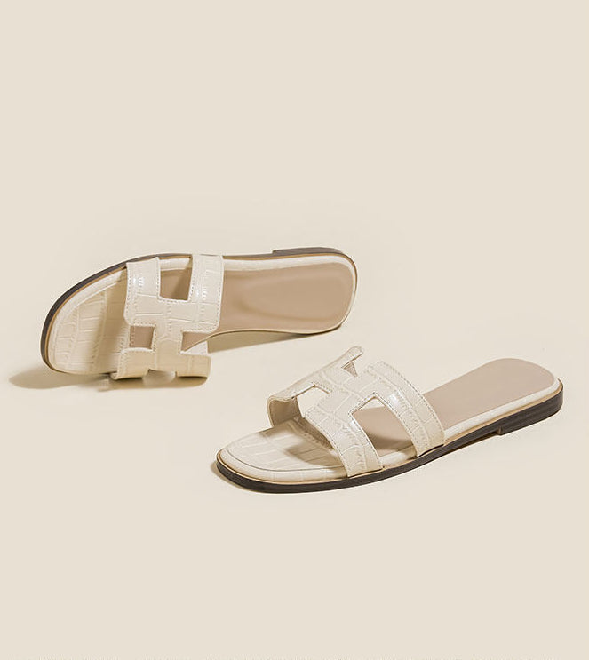 Melba Lane – Nice cream croc-embossed H-strap slide sandals, pair angled on a plain background, AU women's sizes