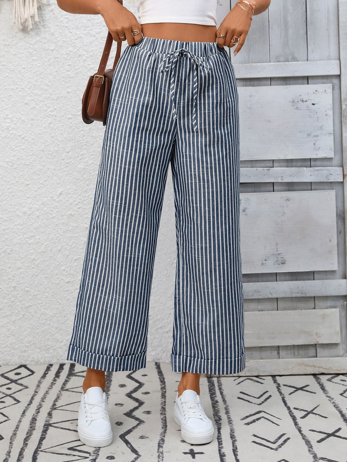 Melba Lane – Devizes denim blue striped cropped wide-leg pants, front view styled with a brown shoulder bag, AU women's sizes