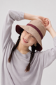 Melba Lane – Tinos tan reversible sun hat with a burgundy band, front view with the wide brim shading the face